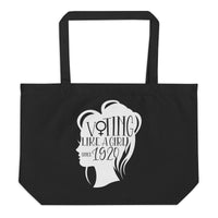 Voting like a girl large black tote